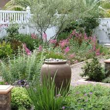 Why dump a load of stone in a garden instead of planting grass or installing a more permanent hardscape surface? 75 Beautiful Gravel Landscaping Pictures Ideas December 2020 Houzz