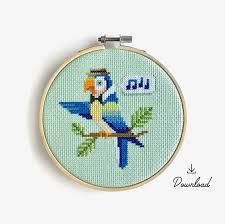 With over 200 designs, you'll find something here that is perfect for your next cross stitch project. Singing Parrot Cross Stitch Pattern Etsy In 2021 Cross Stitch Patterns Stitch Patterns Cross Stitch
