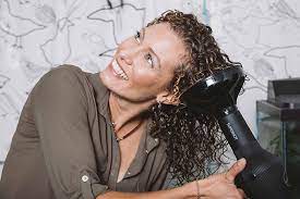 Simply turn your dryer with diffuser attachment on. How To Use A Diffuser Without Ruining Your Curls Naturallycurly Com