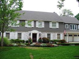 Mounting to siding can be done with exterior wood screws, but mounting to brick requires stone/masonry screws. Midtown Tulsa House Brick Exterior House Colonial House Exteriors Exterior Brick