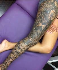 Female tattooist making tattoo by machine on male shoulder. Bottom Half Sleeve Tattoo Ideas For Women Tattoo Design