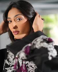 𝐓𝐫𝐨𝐩𝐢𝐜𝐚𝐥 𝐍𝐨𝐢𝐫 Elegance never looked this effortless. A dreamy  black silhouette adorned with delicate floral threadwork and complemented  by a vibrant chiffon dupatta — this outfit is your perfect Eid soirée  statement.