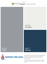 20+ modern grey house exterior color schemes. Blue Grey House With White Trim And Navy Door Grey Exterior House Colors Gray House Exterior Yellow House Exterior