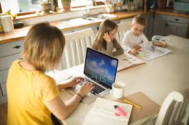 Contrary to the popular belief that work equates to efforts aside from parents' duties as a childcare provider and homemaker, it is thought that housewives or househusbands count as working parents. Siblings Drawing While Mother Working On Laptop In Kitchen At Home Dining Table 8 9 Years Stock Photo 209290694