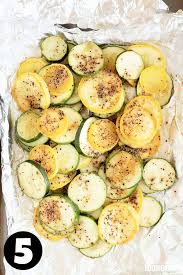 Grilled zucchini and leeks with walnuts and herbs. Hfsezuofguhrzm