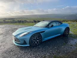 Image result for Concours Blue 2024 Aston Martin