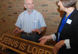 Don Klassen receives certificate and gives AMBS a gift