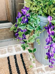 This fern is the perfect plant for a large planter or as a ground cover in your garden! How To Fill An Outdoor Planter With Artificial Flowers And Faux Plants In 2021 Artificial Flowers Fake Potted Plants Outdoor Flowers