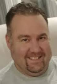 Christopher Warren 'Chris' McHenry, 45, enjoyed cookouts with friends and  family