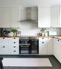 White Ikea Kitchen Black Doorknobs And Handles Range Cooker Oven White Subway Tiles With Grey Grout Sl Slate Floor Kitchen Slate Kitchen White Ikea Kitchen