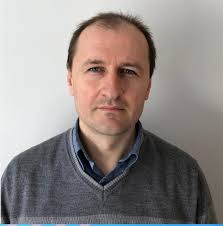 Ecuația Poisson pe varietăți Riemanniene Profesor Ovidiu Munteanu