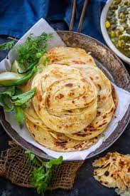 Kerala Parotta Or Malabar Parotta Is A Layered Indian Flatbread Which Goes Great With Curries Here Is How To Make It Indian Food Recipes Recipes Recipe Steps