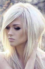 20 Fun Flirty Fashionable Layered Haircuts For Medium Hair Haircuts For Medium Hair Long Shag Hairstyles Edgy Haircuts