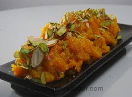 How To Make Gajar Halwa Grated Carrots Khoya Sugar Ghee And Nuts Cooked Together To Make This Delicious Indian Indian Food Recipes Recipes Indian Cooking