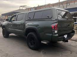 You can luck out and find a camper shell used, but that's more of an option in the denver or slc metro area. Tacoma Suburban Toppers