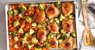 Honey Garlic Chicken Thighs With Carrots Broccoli Recipe Recipes Baked Honey Garlic Chicken Sheet Pan Recipes