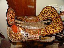 Western saddles are typically made of leather, built for riding over long periods of time while herding cattle. Saddle Wikipedia