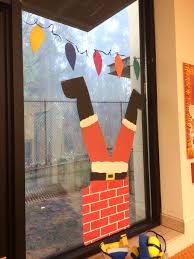 December Christmas Santa Stuck In Chimney Window Display Classroom Christmas Decorations Christmas Classroom Christmas Display