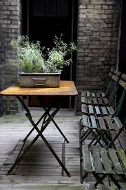 Love The Garden Chairs Metal Table Brick And Plants The Mini Garden Garden Seating Outdoor Furniture Sets