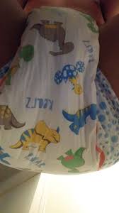Loading up a Rearz Dinosaur diaper - ThisVid.com