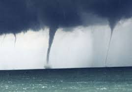 A remarkable meteorological phenomenon, of the nature of a tornado or whirlwind, usually observed over the sea, but sometimes over the land. Science Waterspouts