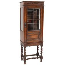 If traditional hutch cabinets aren't really your style, check out this sleek storage unit. Oak Small Jacobean Style China Cabinet 1930s For Sale At 1stdibs