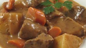 A Mixture Of Cream Of Mushroom Soup And Tomato Sauce Is The Base For This Slow Cooker Beef Slow Cooker Beef Stew Beef Stew Recipe Slow Cooker Recipes Beef Stew