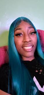 Redacted person name's diamond gold grillz