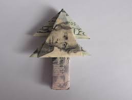 The origami lucky star is fairly simple to make. Christmas Origami Using Money Lovetoknow