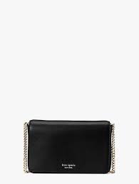 Unsnapping it reveals plenty of pockets (six card slots and a zipper compartment, to be exact) for. Spencer Chain Wallet Kate Spade New York