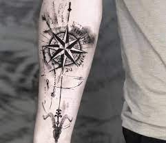 The quote below it, although partially covered by the tattoo shading, reads all who wander are. Top 58 Compass Tattoos