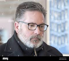 Manager of train operations Jean Demaitre leaves the courtroom Wednesday,  January 10, 2018 in Sherbrooke, Que. Tom Harding, Richard Labrie and  Demaitre are charged with criminal negligence in the disaster that killed