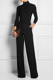 A Fitted Black Turtleneck With Wide Leg Black Pants Is An Easy Classic Look Black Work Outfit Fall Outfits For Work Fashion