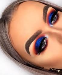 orange and blue eye makeup cat eye makeup