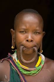 With branding, heated metal rods are pressed into the skin. Improving Nature The World Of Extreme Body Modification