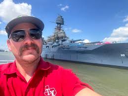 The battleship Texas (BB-35) is shown leaving Norfolk Naval Shipyard in  March 1948 to begin its journey to the state of Texas, where it was  presented as a memorial. Massachusetts (BB-59) sits