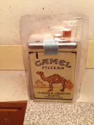 Push the refill valve on the lighter with a screwdriver to let air inside the tank out. Vintage Camel Cigarette Pack Lighter 2 Still In Original Packaging 419739613