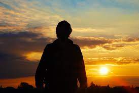 Foto Un hombre contra el sol de stock gratuita - FreeImages.com