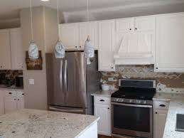 First, the oak cabinets have a light stain and the countertops are white granite. Tips For Painting Oak Cabinets Dengarden