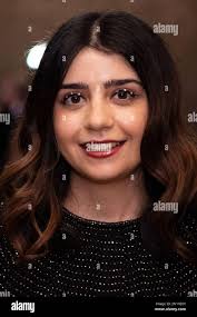Emily Renee poses for photographers upon arrival at the Critics' Circle  Film Awards in London, Sunday, Feb. 5, 2023. (Photo by Vianney Le  Caer/Invision/AP Stock Photo