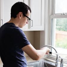 The outside is a hollow metal cylinder with one threaded end that fits the threads on the faucet spout (they're usually inside. How To Clean Your Kitchen Sink Sprayer Kitchn