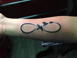 Infinite Sign With Birds It Represents Being Free Forever I Really Love How It Turned Out Picture Was Taken Infinity Tattoos Tattoos Infinity Symbol Tattoo
