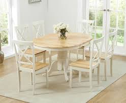 Le cochon aveugle also offers a private dining room or chef's table, for a more intimate experience. Epsom Cream Pedestal Extending Dining Table With Chairs