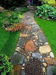 When Your Husband Wants To Just Throw Down A Few Flagstones As A Walkway Show Him This Rock Garden Landscaping Garden Paths Backyard Landscaping