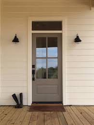 Simple But Sophisticated This Door In Elephant Ear Sw 9168 Looks Beautiful Against The Creamy Ex Best Front Doors Painted Front Doors Front Door Paint Colors