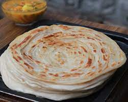 Malabar Paratha Recipe Kerala Parotta Or Barota Or Layered Flatbread Recipe Recipes Paratha Paratha Recipes