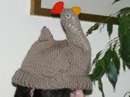 Cable knit hat patterns are so cute! Adults Chicken Hat Free Novelty Knitting Patterns Free Knitting Patterns Nixneedles Uk