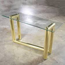 We did not find results for: Vintage Modern Brass Plate Console Sofa Table Glass Top 1970 For Sale At 1stdibs