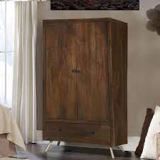 An armoire, a clothes storage idea from the past, is a classic closet alternative. Modern Frontier Rustic Solid Wood Wardrobe Armoire With Drawer