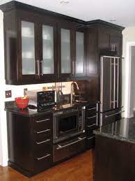 In stock on may 14, 2021. Love The Frosted Glass Panels On These Tall Espresso Cabinets Cute Long Handles Too Brown Kitchen Cabinets Kitchen Remodel Kitchen Cupboards Paint